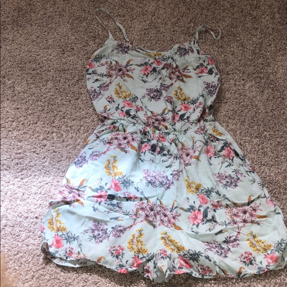 H&M floral romper with pockets and cross back